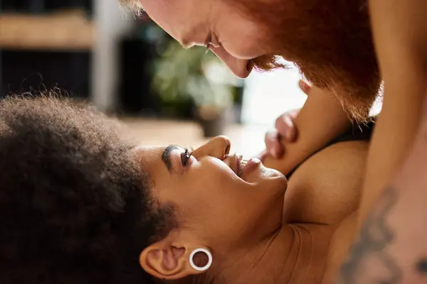 Happy African American Woman Looking Tattooed Boyfriend Beard Bedroom Intimate — Stock Photo, Image