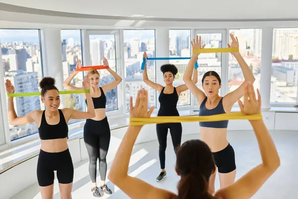 Group Happy Diverse Women Sportswear Looking Trainer Exercising Resistance Bands — Stock Photo, Image