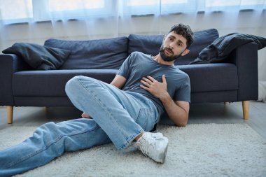 anxious traumatized man in casual home wear having severe panic attack, mental health awareness clipart