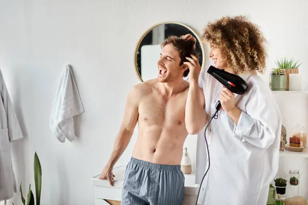 Man Shouting While His Girlfriend Drying His Hair Hairdryer Morning — Stock Photo, Image