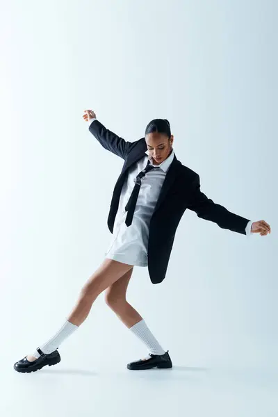 Young Black Woman Stylish Suit Tie Joyfully Dancing Studio — Stock Photo, Image