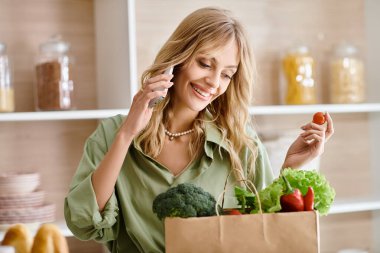 A woman holding a shopping bag with a piece of broccoli. clipart