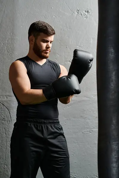 Handsome Man Beard Stands Next Punching Bag Gym Practicing Boxing — Stock Photo, Image