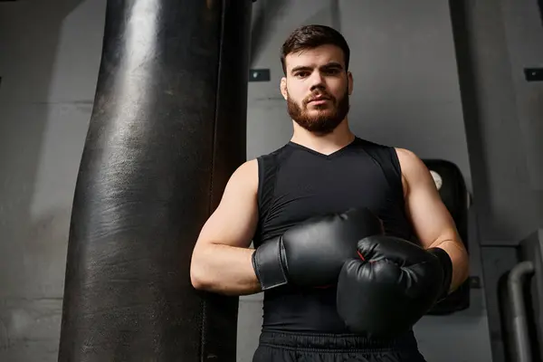 Handsome Man Beard Wearing Boxing Gloves Striking Punching Bag Gym — Stock Photo, Image