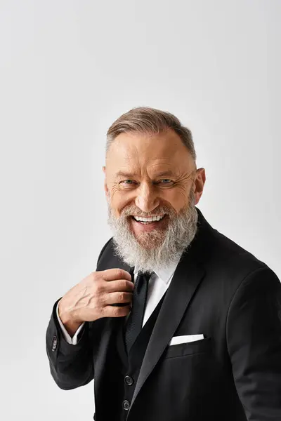 Middle Aged Groom Adjusting His Tie While Smiling Elegant Tuxedo — Stock Photo, Image