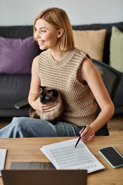 A woman with short hair relaxes on a couch, blissfully holding her cat in her arms, enjoying a quiet moment at home. clipart