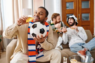 Three cheerful, handsome men of different ethnicities sit together on a couch, enjoying a relaxed and jovial moment of friendship at home. clipart