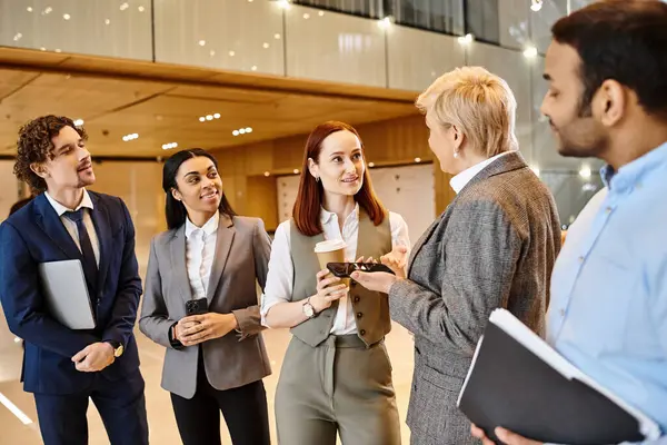 stock image Multicultural professionals in a circle discussing strategy.