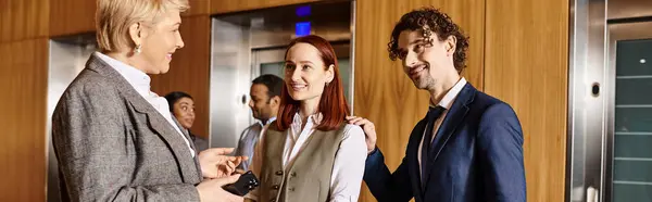 stock image A diverse group of business people standing in a circle, collaborating and networking.