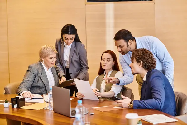 stock image Multicultural group of business professionals discussing ideas in a meeting.