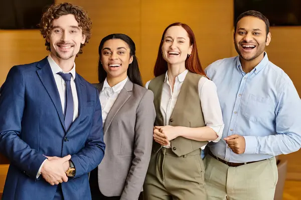 stock image An interracial group of business people standing together.