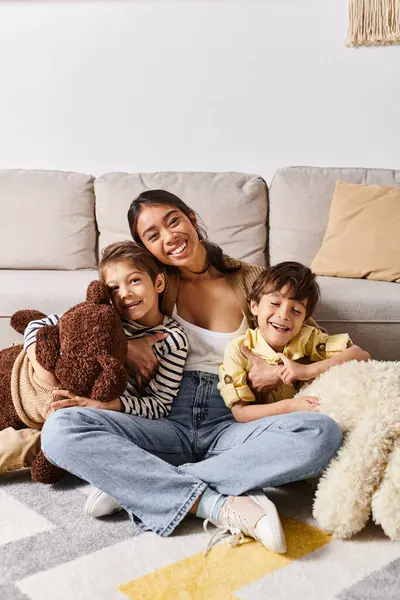 Young Asian Mother Sitting Floor Her Two Children Accompanied Teddy — Stock Photo, Image