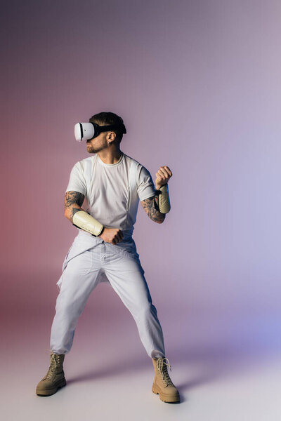A man in a baseball uniform confidently grips a baseball bat, ready to take a powerful swing in a studio setting.