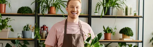 Man Stands Proudly Front Shelf Brimming Lush Potted Plants His — Stockfoto