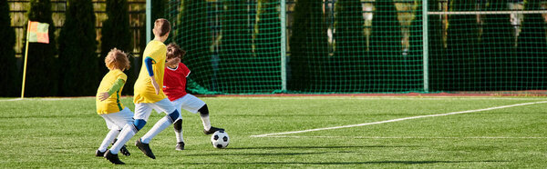 A group of young men passionately play a game of soccer, showcasing their skills, teamwork, and competitive spirit on the field. Dressed in colorful jerseys, they run, kick, and strategize to score goals and outmaneuver their opponents.
