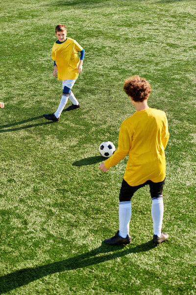 A spirited group of young men engaged in a competitive game of soccer on a vibrant field. They are running, passing, and shooting the ball with energy and enthusiasm.