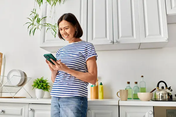 Woman Cozy Homewear Stands Kitchen Holding Tablet — Stock Photo, Image