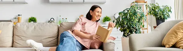 Mature Woman Comfortable Homewear Sitting Couch Lost Book — Stock Photo, Image