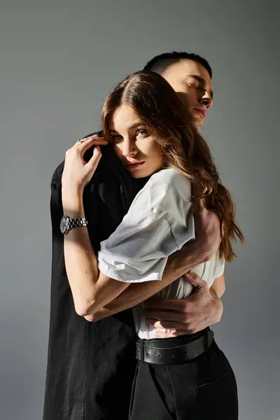 Man Woman Loving Embrace Expressing Closeness Affection Studio Setting Grey — Stock Photo, Image
