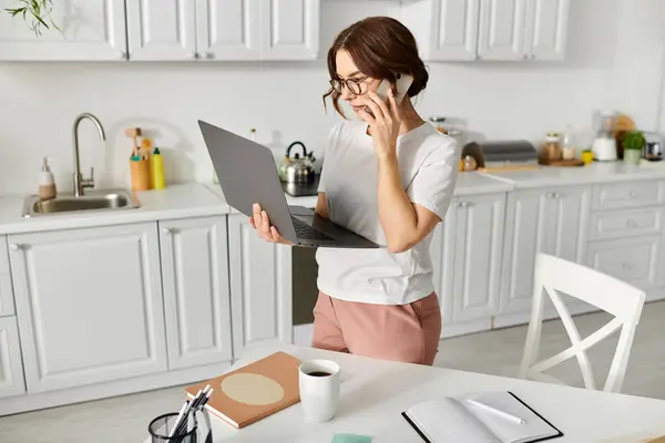 Middle Aged Woman Talking Cell Phone Holding Laptop — Stock Photo, Image