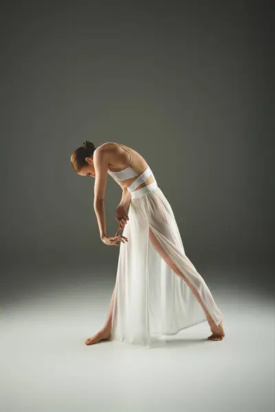 Young Ballerina White Dress Gracefully Bends While Dancing — Stock Photo, Image