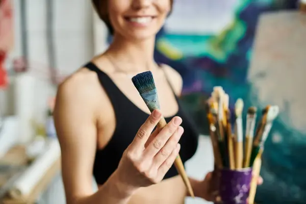 Woman Holds Paintbrush Ready Create Art — Stock Photo, Image