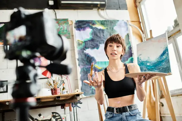 Woman Sits Chair Front Captivating Painting Immersed Its Beauty — Stock Photo, Image