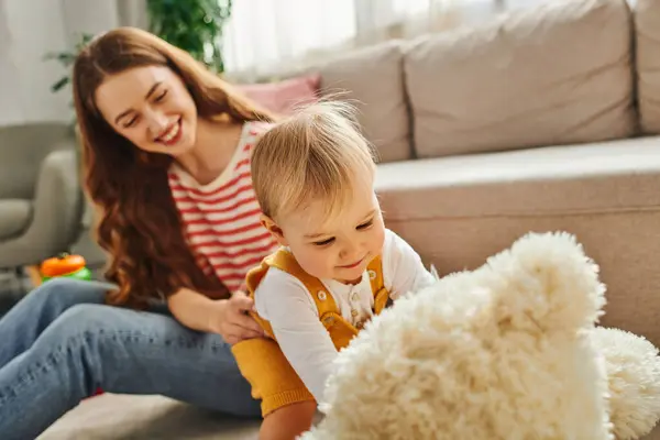 Young Mother Sits Floor Next Her Little Baby Girl Engaging — Stock Photo, Image