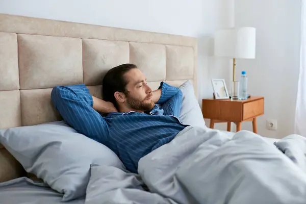 Man Lies Bed His Head Pillow Deep Relaxation — Stock Photo, Image