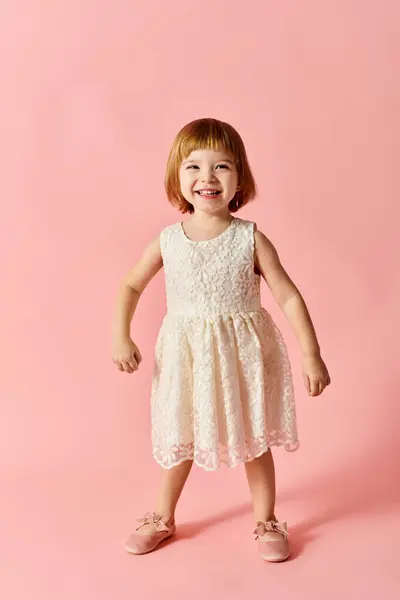 Adorable Child Wearing White Dress Standing Pink Background — стоковое фото