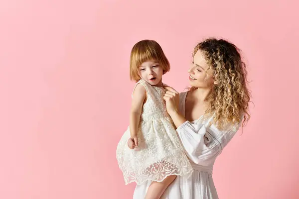 Mother White Dress Holding Girl White Dress Pink Background — Photo