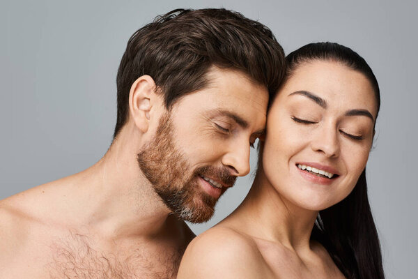 Attractive couple posing together.