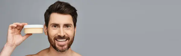 Bearded Man Holding Container Cream Skincare — Stock Photo, Image