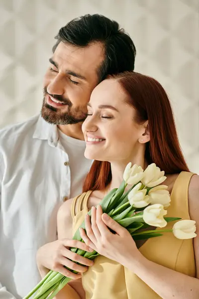 Redhead Woman Bearded Man Holding Bouquet Tulips Sharing Tender Moment — Stockfoto