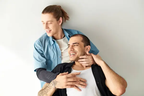 Man Smiles While Holding Another Mans Shoulder Lovingly — Stock Photo, Image