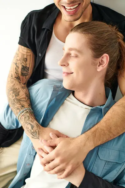 Man Tenderly Holds His Boyfriend His Arms —  Fotos de Stock