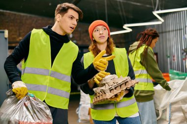 Young volunteers in safety vests and gloves sorting trash together, showing eco-conscious actions.
