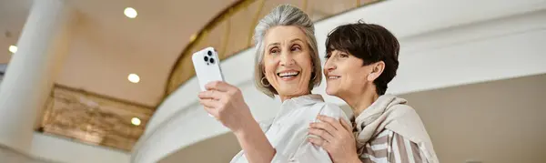 Senior Lesbian Couple Joyfully Taking Picture Her Cell Phone — Foto de Stock
