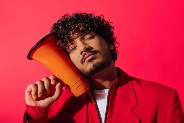 Vibrant Young Indian Man Holding Red Orange Megaphone — Stok fotoğraf