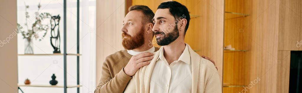 Two happy men stand next to each other in a modern living room, showcasing love and togetherness in their LGBT relationship.