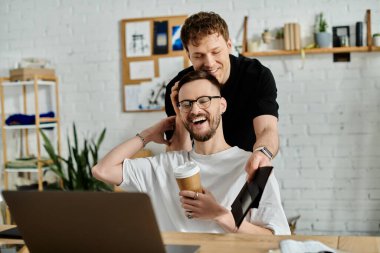 A man lovingly helps his partner style his hair in a designer workshop. clipart
