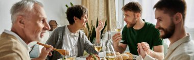 A gay couple enjoys a meal with parents at home. clipart