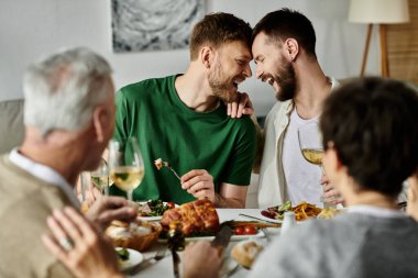 A gay couple enjoys a dinner with their family. clipart