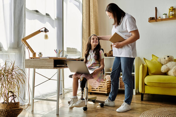 A brunette mother and her daughter, who has a prosthetic leg, are spending quality time together at home.