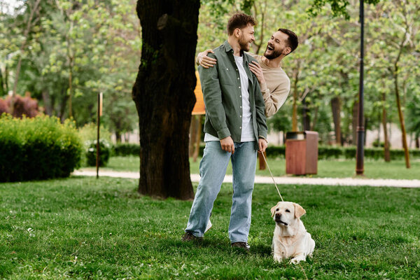 Two bearded gay men in casual attire walk their labrador dog through a green park, enjoying a sunny afternoon.