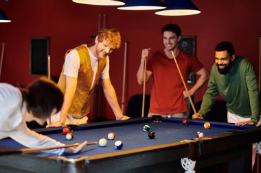 Friends play pool in a dimly lit room, laughing and enjoying each others company. clipart