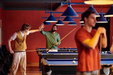 Friends enjoy a game of pool in a brightly lit pool hall. clipart