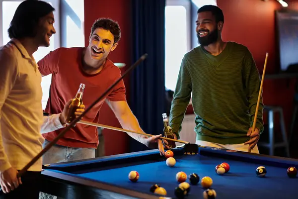 stock image Friends play billiards, laughing and enjoying each others company.