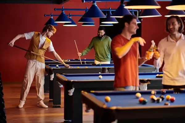 stock image Friends enjoying a casual billiards game at a dimly lit pool hall.