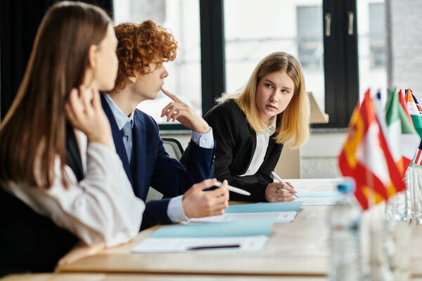 Teenagers participate in a Model UN simulation.